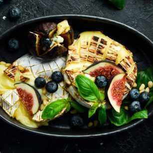Baked Brie With Fig Jam And Toasted Baguette Slices