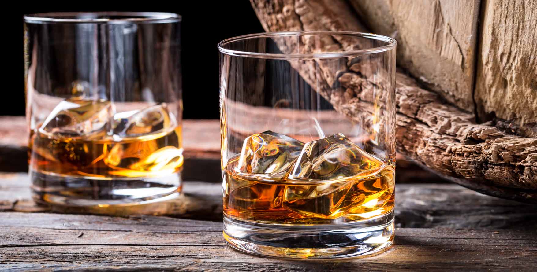 Whiskey on Table with Barrel